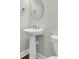 Small but stylish, the bathroom features a pedestal sink and modern fixtures at 327 Tupelo Lake Dr, Summerville, SC 29486