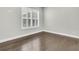 Bedroom with hardwood floors and white shutters, ready to be customized at 327 Tupelo Lake Dr, Summerville, SC 29486