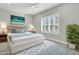 Inviting bedroom featuring a large window, ceiling fan and modern furnishings at 327 Tupelo Lake Dr, Summerville, SC 29486