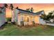 Attractive home with a landscaped yard and covered entry at 327 Tupelo Lake Dr, Summerville, SC 29486