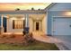 Close up of home with covered porch and tidy lawn at 327 Tupelo Lake Dr, Summerville, SC 29486