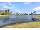 Scenic lake view showcasing the calm water reflecting surrounding trees and neighboring houses at 327 Tupelo Lake Dr, Summerville, SC 29486
