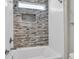 A stylish shower featuring modern tiling and a built-in niche for toiletries at 327 Tupelo Lake Dr, Summerville, SC 29486