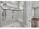 Luxurious marble shower includes dual shower heads, a built-in seat, and glass enclosure at 327 Tupelo Lake Dr, Summerville, SC 29486