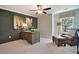 Stylish office with wainscoting, a ceiling fan, and comfortable seating area, perfect for working from home at 3307 Sawlog Dr, Summerville, SC 29486