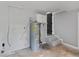 This basement has concrete floors, gray walls, and an electric water heater at 346 Horseshoe Rd, Moncks Corner, SC 29461