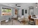 Open-concept living space featuring comfortable seating, a natural light window, and kitchen island at 346 Horseshoe Rd, Moncks Corner, SC 29461