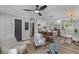 Open-concept living space with a kitchen island, a dining area, and a cozy living room at 346 Horseshoe Rd, Moncks Corner, SC 29461