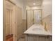 Bathroom features double sinks, tile floors, and a glass-enclosed shower at 35 Society # H, Charleston, SC 29401