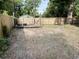 Large backyard featuring a wooden deck and fence, providing a private outdoor space for relaxation and entertainment at 354 Deloach Ave, Walterboro, SC 29488