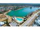 Aerial view showcasing a community pool and surrounding homes with a view of the pond at 3587 Goodwater St, Mount Pleasant, SC 29466