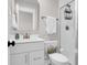 Stylish bathroom features a sleek vanity, mirrored cabinet and modern glass shower at 3587 Goodwater St, Mount Pleasant, SC 29466