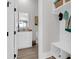Half bathroom with nice mirror and lighting, perfect for guests at 3587 Goodwater St, Mount Pleasant, SC 29466