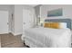 Inviting bedroom with white bedding, neutral walls, and soft natural light at 3587 Goodwater St, Mount Pleasant, SC 29466