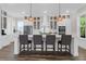 Modern kitchen with stainless steel appliances, white cabinets, and a large island at 3587 Goodwater St, Mount Pleasant, SC 29466
