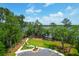 Scenic park with mature trees, winding paths, and accessible parking, offering serene views of the nearby water at 3587 Goodwater St, Mount Pleasant, SC 29466