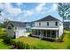 Aerial view of white home exteriors, lush greenery, and well-manicured lawns at 3587 Goodwater St, Mount Pleasant, SC 29466