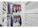 Spacious walk-in closet with custom shelving, hanging racks, and storage drawers at 3587 Goodwater St, Mount Pleasant, SC 29466