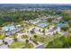 Sprawling aerial view of a resort community showcasing pools, tennis courts, and lush landscaping at 3756 Colonel Vanderhorst Circle, Mount Pleasant, SC 29466