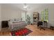 Bright bedroom with hardwood floors, natural light, and a ceiling fan at 3756 Colonel Vanderhorst Circle, Mount Pleasant, SC 29466