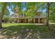 Spacious home with multi-story decks and a well-manicured lawn surrounded by mature trees at 3756 Colonel Vanderhorst Circle, Mount Pleasant, SC 29466