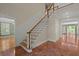 Open foyer with staircase and beautiful flooring leads to other rooms at 3756 Colonel Vanderhorst Circle, Mount Pleasant, SC 29466