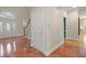 Welcoming foyer featuring stylish tile flooring, staircase, and an elegant front door at 3756 Colonel Vanderhorst Circle, Mount Pleasant, SC 29466