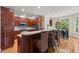Gourmet kitchen with granite counters, stainless appliances, and beautiful wood cabinetry at 3756 Colonel Vanderhorst Circle, Mount Pleasant, SC 29466