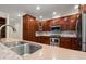 Kitchen featuring granite countertops, stainless steel appliances, and rich wood cabinetry at 3756 Colonel Vanderhorst Circle, Mount Pleasant, SC 29466