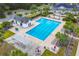 Aerial view of a community pool with lounge seating and palm tree landscaping at 3756 Colonel Vanderhorst Circle, Mount Pleasant, SC 29466