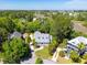 Aerial view of a gorgeous home surrounded by trees and overlooking the marsh at 380 Tidal Reef Cir, Mount Pleasant, SC 29464