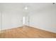Spacious bedroom with wood floors and painted beadboard paneling on accent wall at 380 Tidal Reef Cir, Mount Pleasant, SC 29464