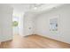 Comfortable bedroom with hardwood floors, wainscoting, a ceiling fan, and windows at 380 Tidal Reef Cir, Mount Pleasant, SC 29464