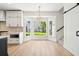 Charming dining area with a bay window offers abundant natural light and backyard views at 380 Tidal Reef Cir, Mount Pleasant, SC 29464