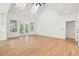 Spacious living room with vaulted ceilings and French doors leads to an outdoor porch at 380 Tidal Reef Cir, Mount Pleasant, SC 29464