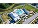 Aerial view of resort-style pool and clubhouse for residents to enjoy, surrounded by lush landscaping at 403 Cool Bend Ln, Summerville, SC 29486