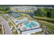 An aerial view of the clubhouse, pool, tennis courts, and other community ammenities at 403 Cool Bend Ln, Summerville, SC 29486