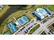 Aerial view of resort-style amenities with tennis courts, pool, clubhouse and green spaces for recreation at 403 Cool Bend Ln, Summerville, SC 29486