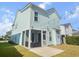 Beautiful backyard showcasing the home's exterior, a screened-in porch, and lush green grass at 403 Cool Bend Ln, Summerville, SC 29486