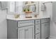 Bathroom featuring a double vanity with gray cabinets, stylish fixtures, and quartz countertop at 403 Cool Bend Ln, Summerville, SC 29486