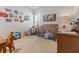 Cozy Bedroom with a wooden crib, toys, and playful wall art for a welcoming atmosphere at 403 Cool Bend Ln, Summerville, SC 29486