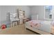 Charming bedroom featuring a vanity, dresser, and floral bedding, creating a delightful space at 403 Cool Bend Ln, Summerville, SC 29486