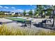 Outdoor bocce ball court with benches and manicured landscaping, great for community recreation at 403 Cool Bend Ln, Summerville, SC 29486
