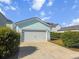 Detached two car garage with a concrete driveway at 403 Cool Bend Ln, Summerville, SC 29486