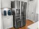 Modern kitchen with stainless steel refrigerator and white cabinets at 403 Cool Bend Ln, Summerville, SC 29486