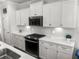 Beautiful kitchen with white cabinets and stainless steel appliances at 403 Cool Bend Ln, Summerville, SC 29486