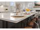 Kitchen island features quartz countertops and gold hardware at 403 Cool Bend Ln, Summerville, SC 29486