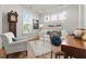 Bright living room featuring hardwood floors, ample natural light, and stylish furniture at 403 Cool Bend Ln, Summerville, SC 29486