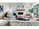 Comfortable living room with modern fireplace and comfortable seating at 403 Cool Bend Ln, Summerville, SC 29486