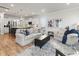 Open living room with modern decor, art, and plenty of natural light at 403 Cool Bend Ln, Summerville, SC 29486